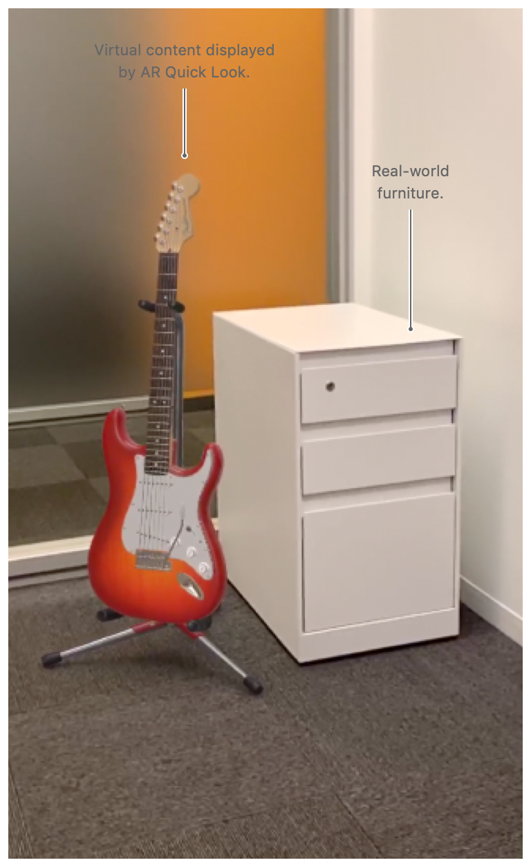 Apple の AR Quick Look を使って疑似的に室内映にギターが置かれている様子のキャプチャ